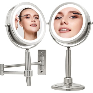 image:imageOVENTE 7 Lighted Makeup Mirror with 1X8X Magnification Cordless MultiFunctional Round Vanity Mirror with 360 Swivel Design Double Sided and Three Toned LED Lights Nickel Brushed MFM70BR1X8XNickle Brushed